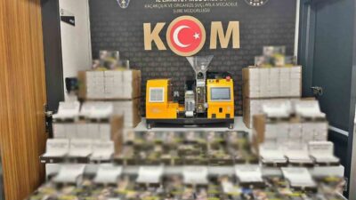 Afyonkarahisar’da polis tarafından bir eve yapılan baskında sigara doldurma makinesi