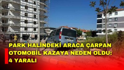 Uşak’ta yabancı plakalı bir otomobilin park halindeki hafif ticari araca
