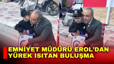 Afyonkarahisar İl Emniyet Müdürü Ahmet Birtan Erol, minik bir çocukla