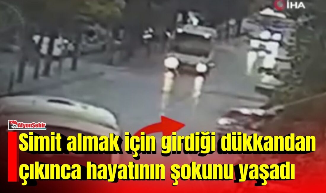 Afyonkarahisar’da simit almak için işletmeye giren bir kişinin çalışır vaziyette